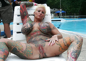 Busty beautiful women with tattoos