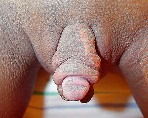 Sexy mature poses not far from huge clit naked pictures