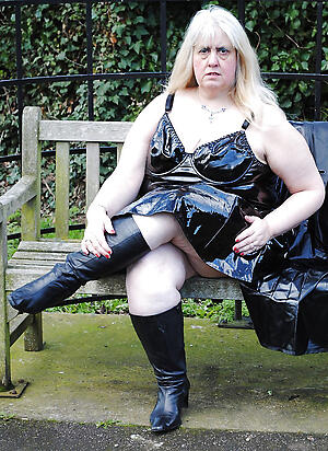Absorbing mature in latex undressed